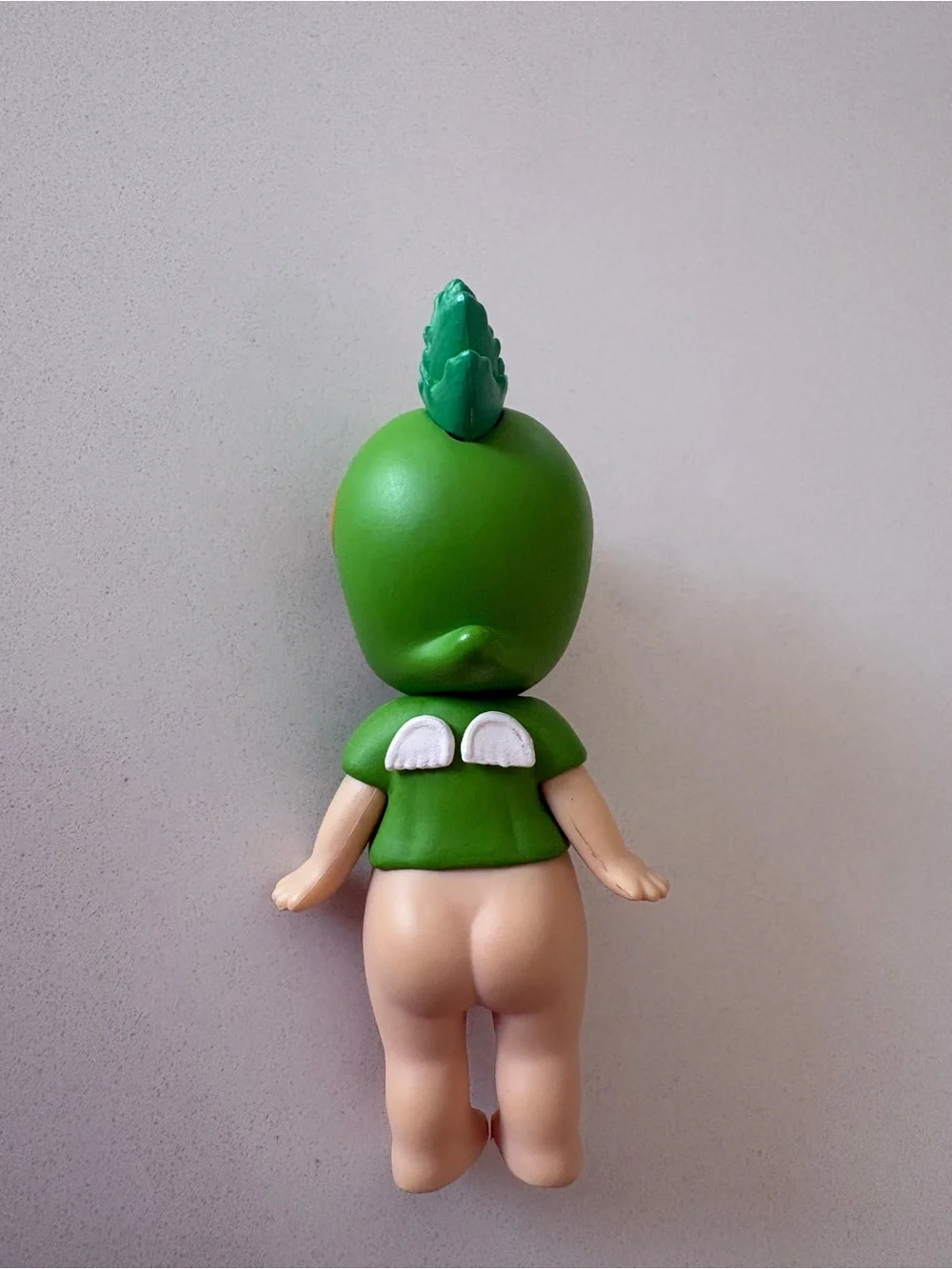 Green Baby Doll Figure in Bird Costume - Kids Toy